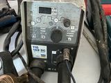 an image of a soldering machine is sitting on top of a table