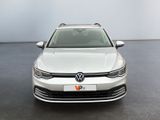 the front view of a white volkswagen vw golf parked in a room