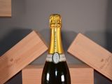 a bottle of champagne that is sitting on a table