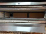 an image of a stainless steel oven in a kitchen