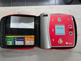 a red and black case that has a card reader inside of it