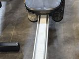 an image of a gym room with treads and machines