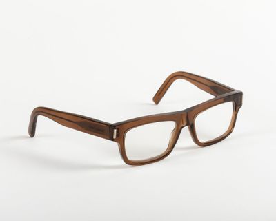 the glasses are made of wood and have a clear lens