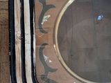 a picture of a decorative mirror on the wall