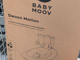 a cardboard box with a picture of a baby in a stroller