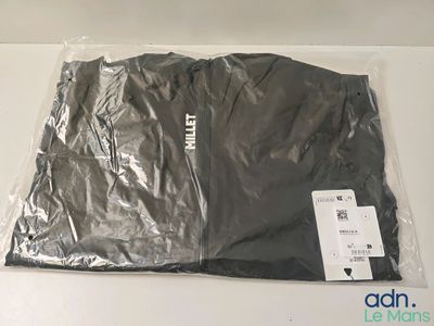 a plastic bag that has a black shirt on it