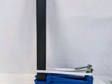 a close up of a pair of tools sitting on top of a table