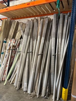 a lot of rolls of paper on the shelves