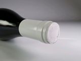 a bottle of wine that is sitting on a table