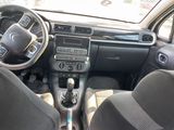 a picture of a car with a steering wheel and dashboard