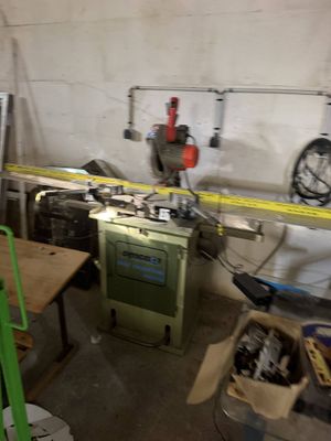 an image of a room with a stove and a work bench
