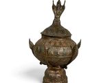 an image of a bronze incense pot with a bird on top of it