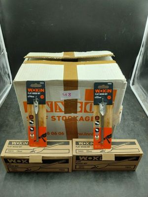 three boxes of woodworking tools sitting on top of a table