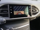 a picture of a car dashboard with a digital display
