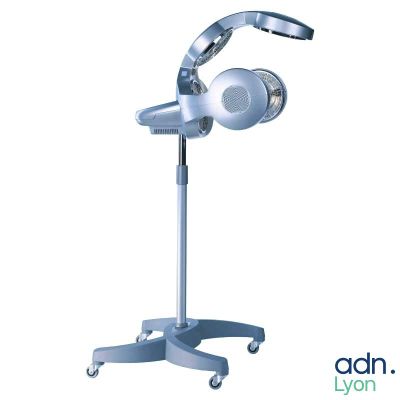 a close up of a medical device on a stand on a white background