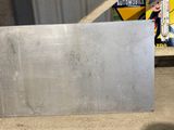 a skateboard that is sitting on the ground in the garage