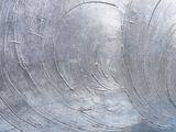 a painting of a blue and white wave on the wall