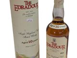une photo d'une bouteille de whisky Edradour à côté d'une boîte en carton