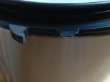 a close up of a crock pot on a counter
