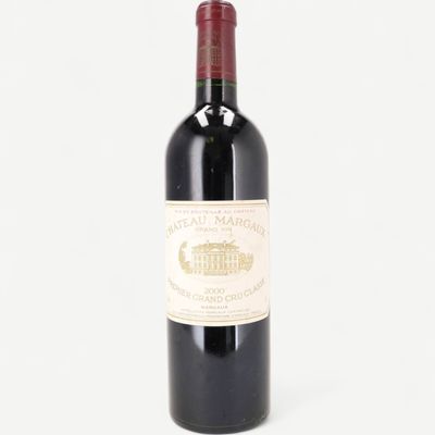 a bottle of wine that is sitting on a table