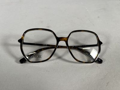 the glasses are on the table ready to be worn