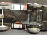 an image of a model of a truck with wheels