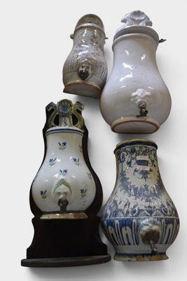three vases that are sitting next to each other on a table