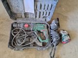 a tool in a case that is sitting on the floor