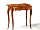 a small wooden table with a drawer on top of it