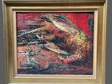 painting of a crab in a gold frame on a red background