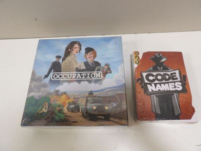 two dvds are sitting on a table next to each other