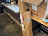 a cardboard box sitting on top of a wooden table
