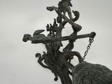 an image of a bell hanging on a wall