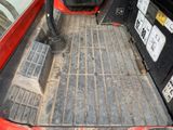 an image of a truck bed with the back of it ' s bed open