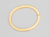 un bracelet rigide en or jaune 18 carats