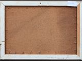 an old picture frame with a piece of paper taped to it