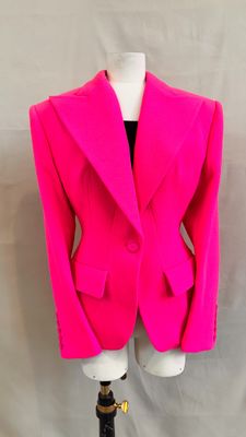 a pink blazer jacket on a mannequin mannequin mannequin mannequin mannequin mannequin mannequin mannequin mann