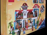 a box that has a lego disney castle set in it