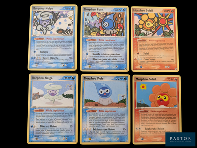 Quatre cartes Pokémon différentes sont représentées sur un fond noir.