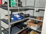 many boxes and boxes on the shelves in the room