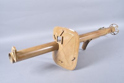 a wooden object with a wooden handle on a white background