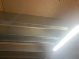 a light that is shining on the ceiling of a building