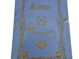 an old blue book with gold writing on it