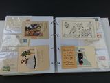 an open book with stamps on it sitting on a table