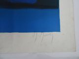 an image of a blue and black painting on a white wall