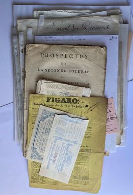 a lot of papers that are sitting on a table