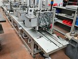 many machines that are sitting in a room