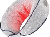 un gros plan d'un oreiller cervical sur lequel brille une lumière rouge