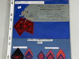 a picture of a piece of paper with some patches on it