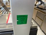 a picture of a parking meter with a sticker on it